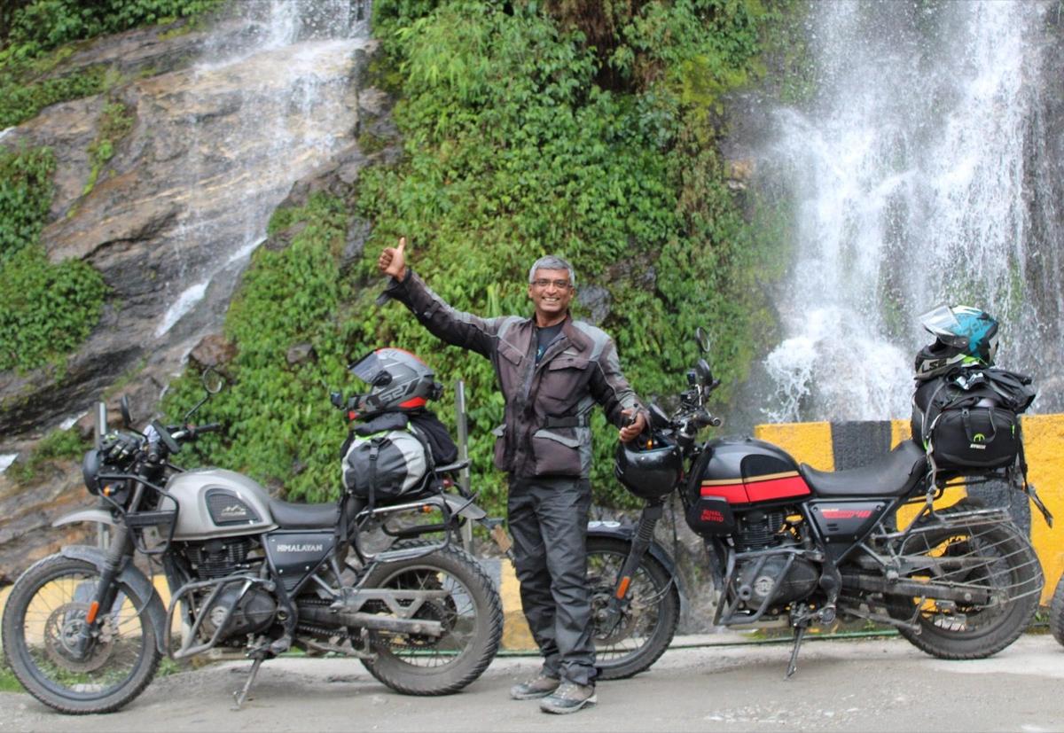 John Baptisa riding through the Western Ghats